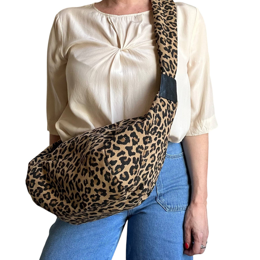 Brixton cross body sling bag - sand leopard print - large