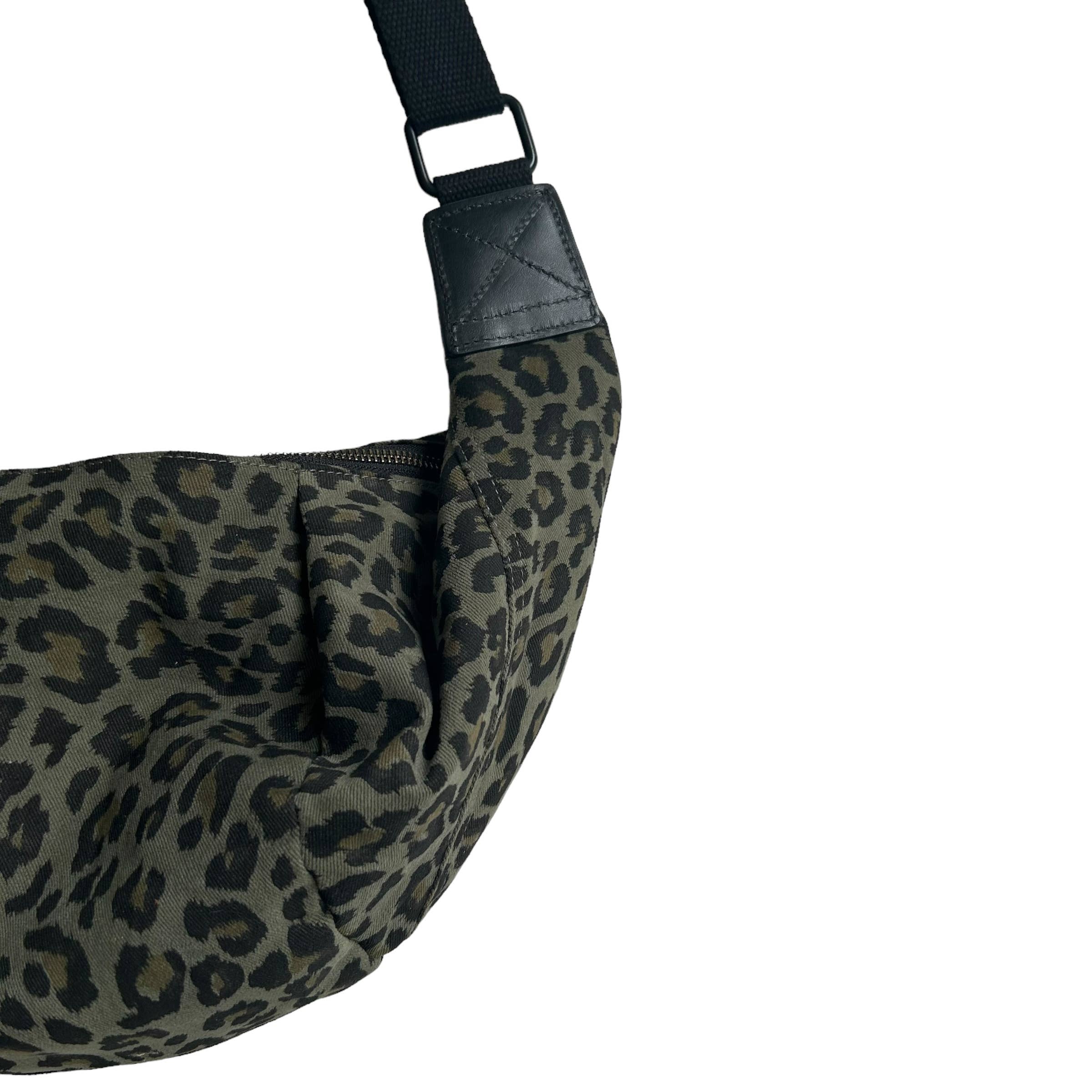 Brixton cross body sling bag - green leopard print  - large