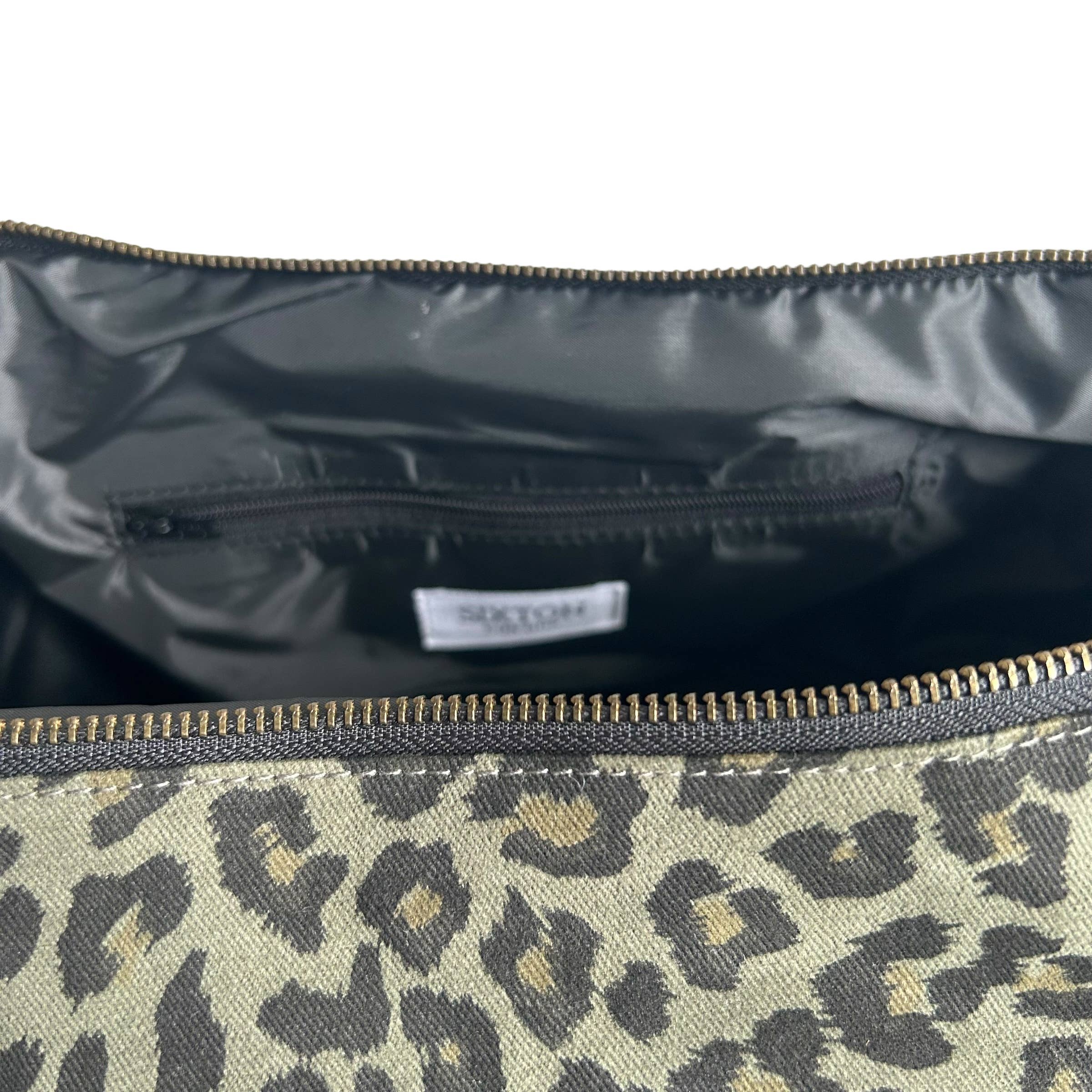 Brixton cross body sling bag - green leopard print  - large